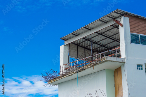 Fotografia Building uncomplete with blue sky.