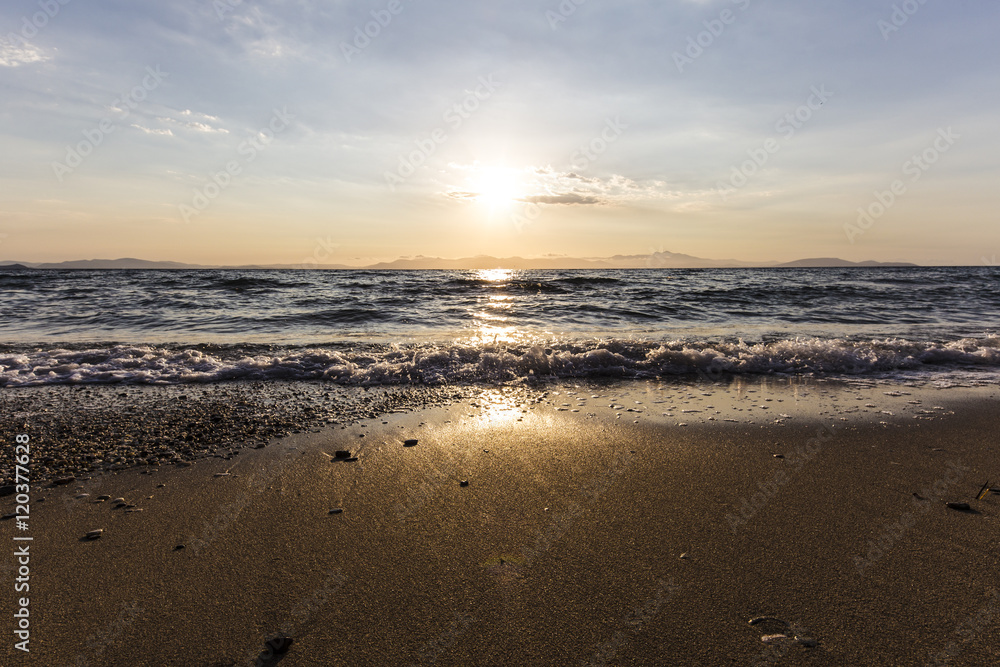 Sunrise on the beach, Rafina town, Greece