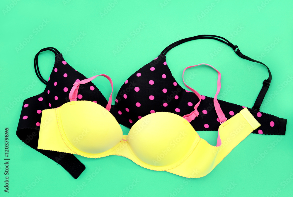 Summer concept, bra on on blue background. (Pop art style) Summer concept, bra on on blue background. (Pop art style)