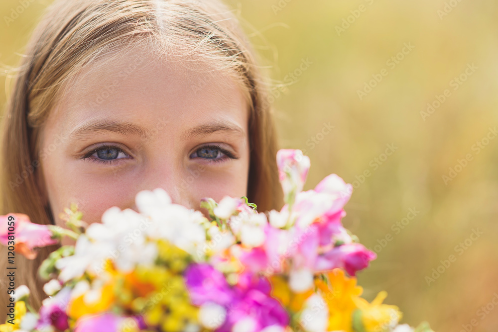 Cute female child with field bouquet Cute female child with field bouquet