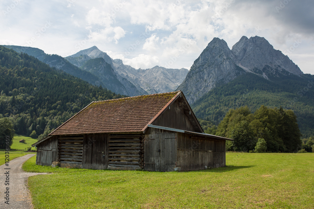 wooden hut at the foot of Bavarian alps