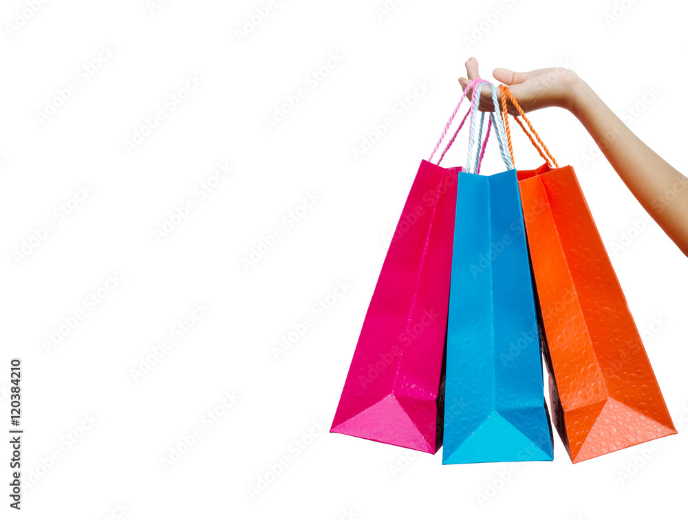 Hand hold shopping bags, white background.