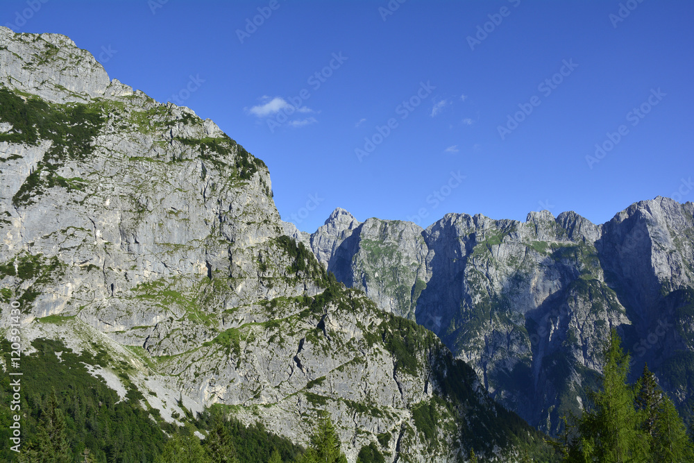Fototapeta premium The alpine scenery along the Mangrt Road on Mangrt mountain, the third highest peak in Slovenia. The 12km road, built by the Italian army in 1938, is the highest road in Slovenia. 