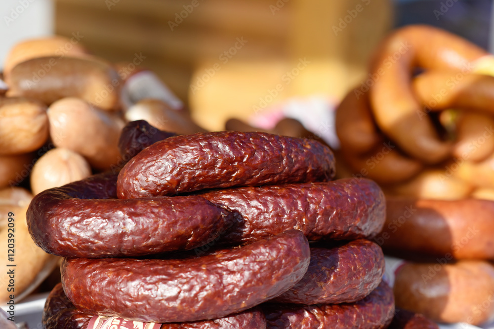 Fototapeta premium Smoked sausage is homemade on the trade counter