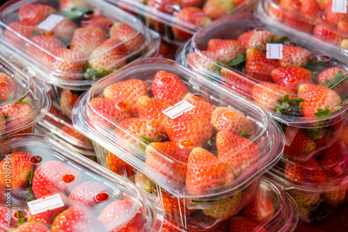 Strawberry ripe packed in plastic boxes