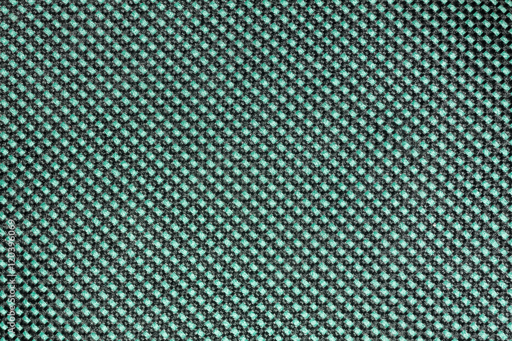 Green fishnet cloth material as a texture background. Nylon