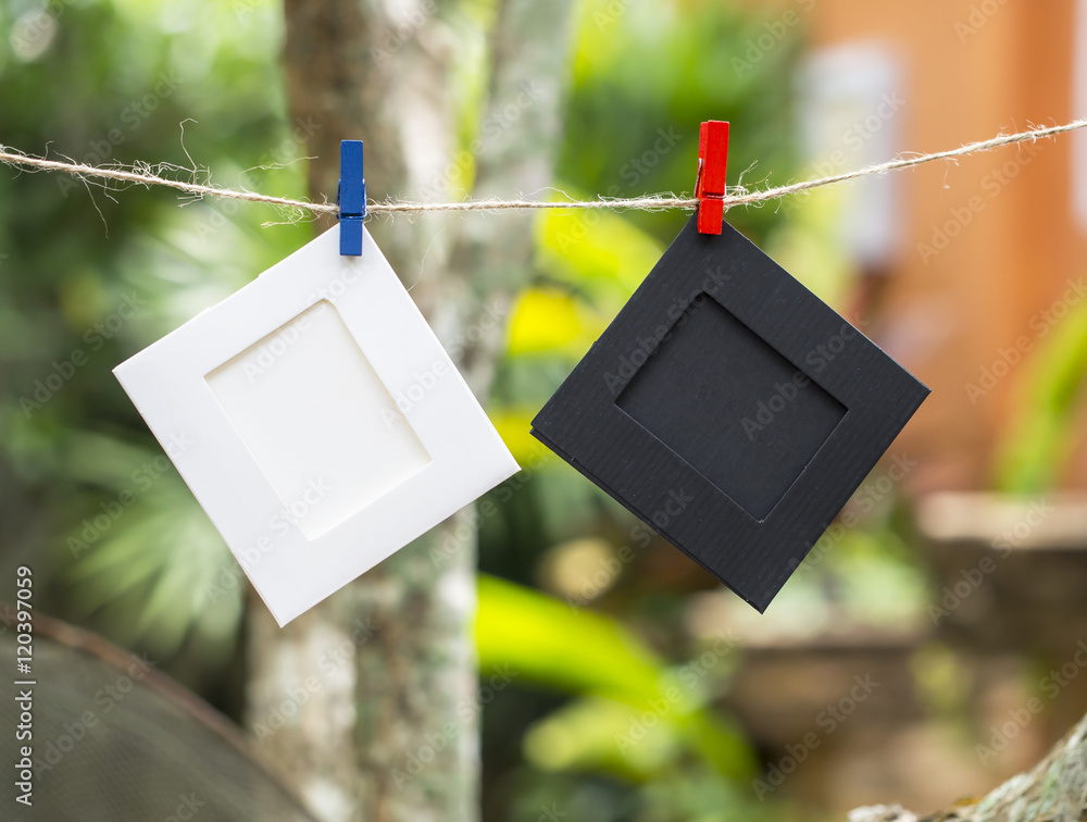 Photo Frames on Rope. background the nature, soft focus.