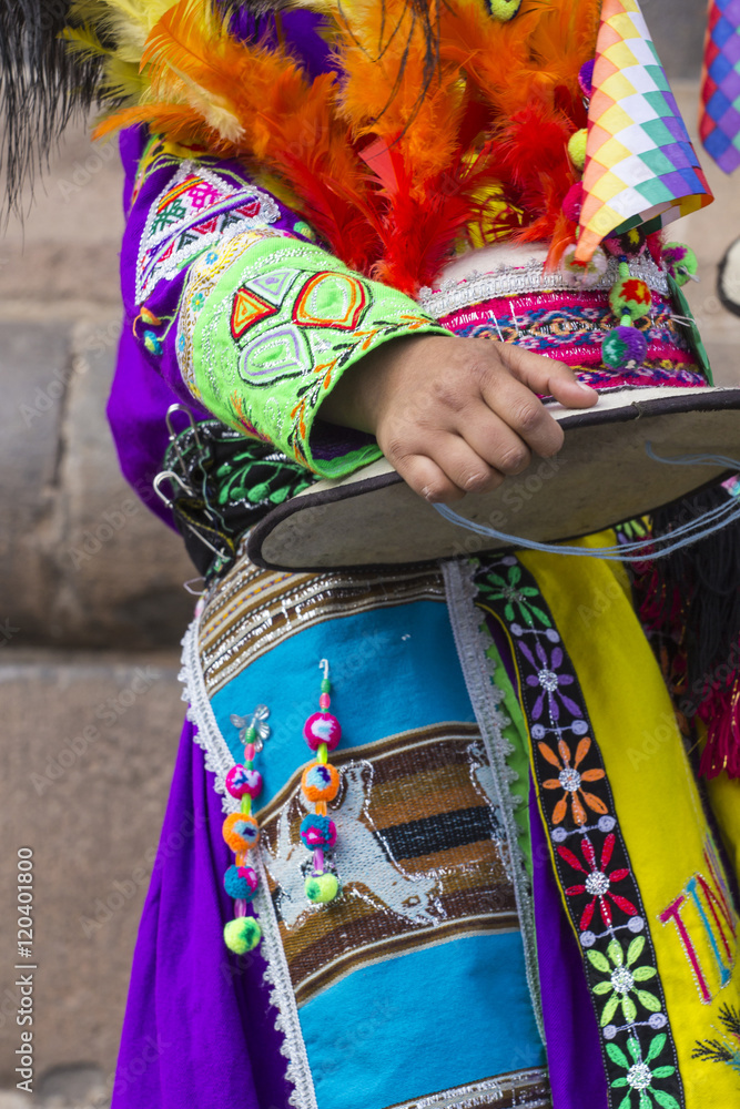 Peruvian dancers at the parade in Cusco. People in traditional clothes.