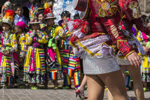 Peruvian dancers at the parade in Cusco. People in traditional clothes.