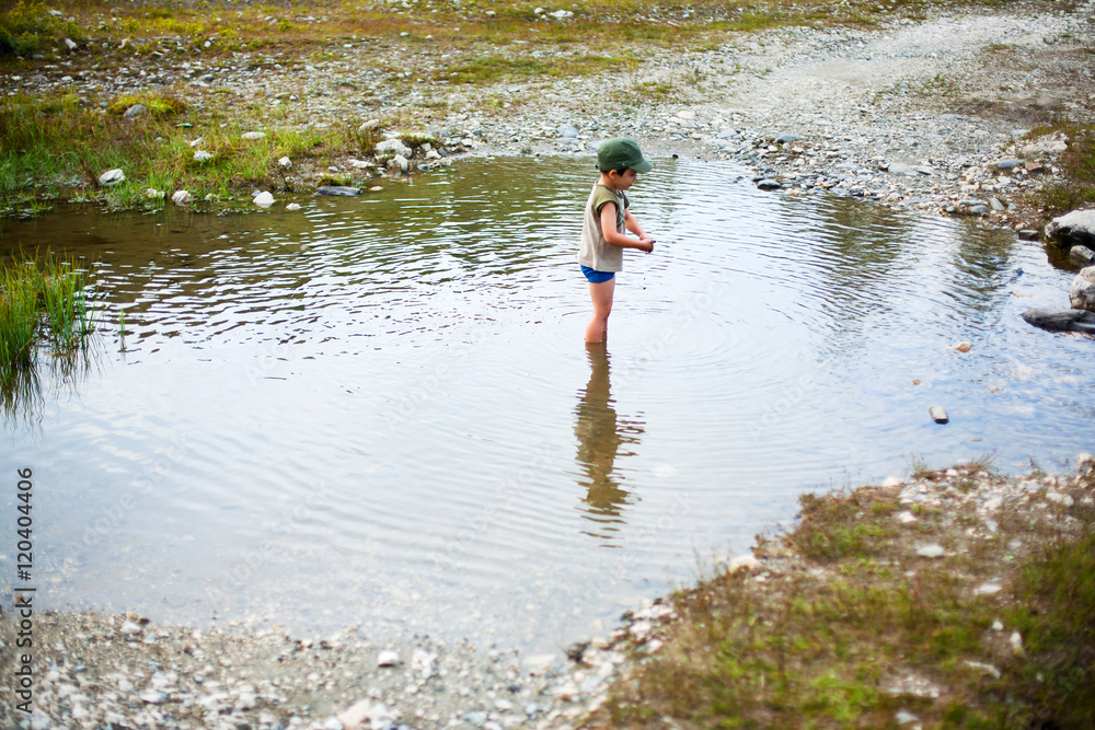 Fototapeta premium Playing in river