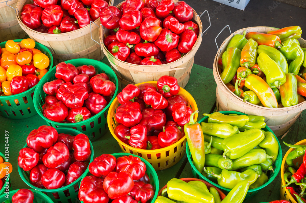 Romanian Gogosari and Carmer Peppers in a basket at the market Romanian Gogosari and Carmer Peppers in a basket at the market