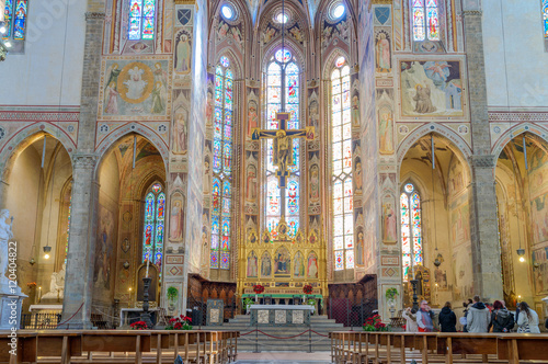 High altar with a wooden painted crucifix icon in the basilica Santa Croce Florence