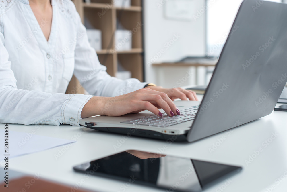 Working with laptop woman writing a blog. Female hands on the keyboard. Working with laptop woman writing a blog. Female hands on the keyboard.