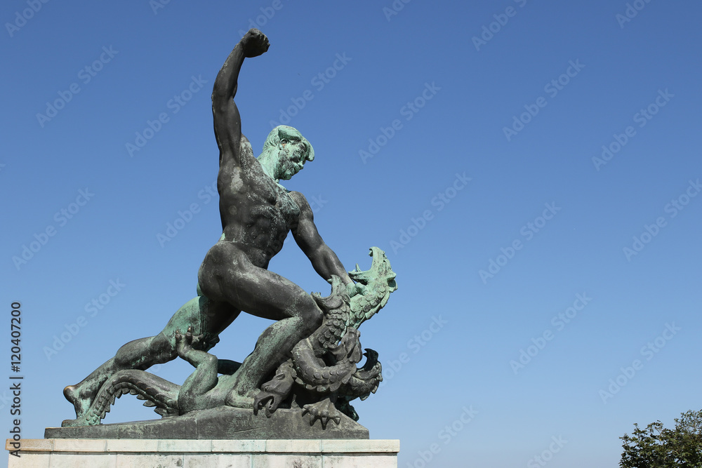 Statue of a man killing the fascism dragon close up, Gellért Hill, Budapest