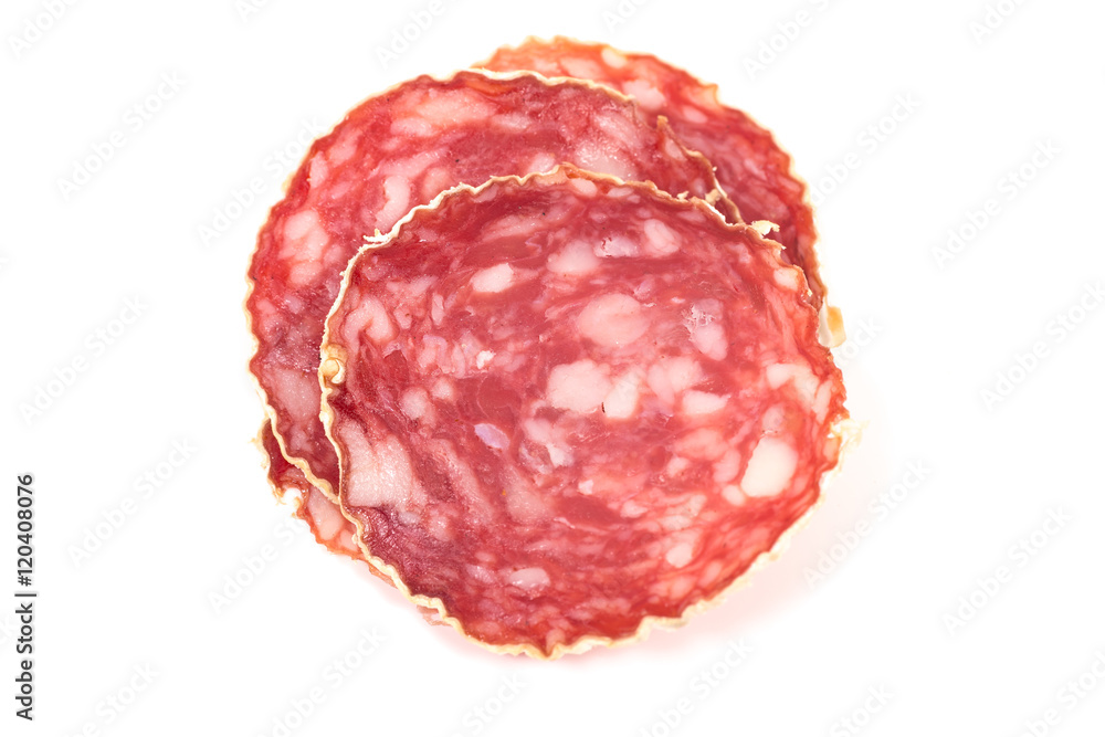 Slices of salami sausage on a white background Slices of salami sausage on a white background