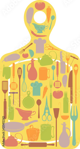 various cooking utensils on a cutting board