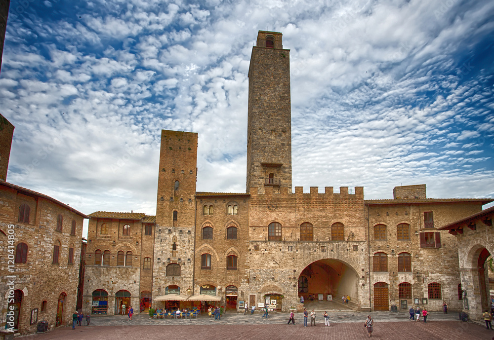 Panoramic view of famous Piazza del Duomo in San Gimignano , Siena,  Tuscany, Italy