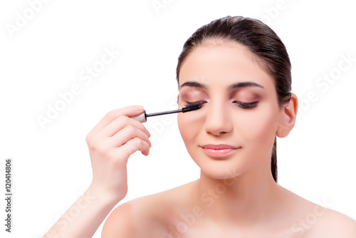 Beautiful woman during make-up cosmetics session