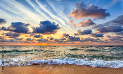 Dramatic sunrise at tropical beach