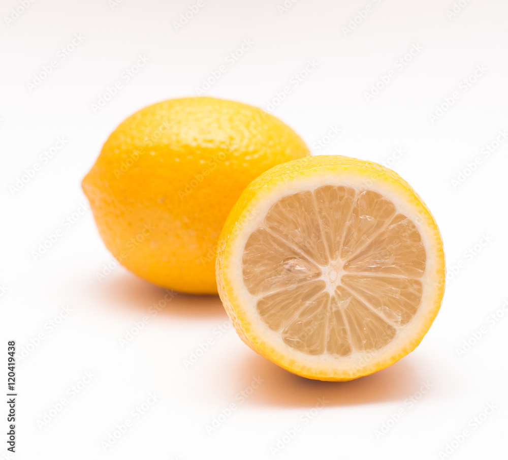 Two lemons on a light background