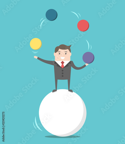Businessman balancing on ball