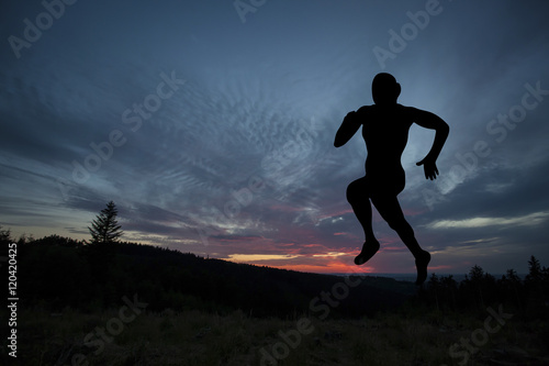 Wallpaper Mural Silhouette of runner during outdoor cross-country running Torontodigital.ca