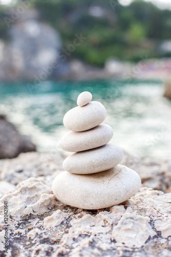 Balance stone on sea coast. Zen rocks on the beach  
