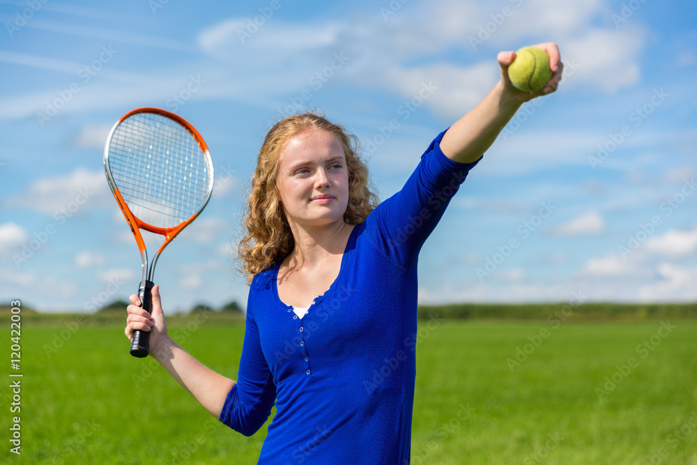 Εκτύπωση καμβά Young dutch woman holding tennis racket and ball outdoors