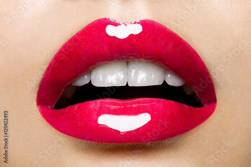 Fotografiet beautiful red female lips with glitter