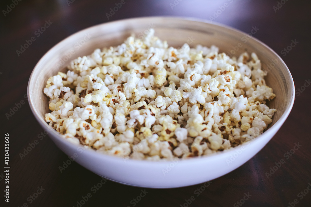 large white plate with popcorn large white plate with popcorn