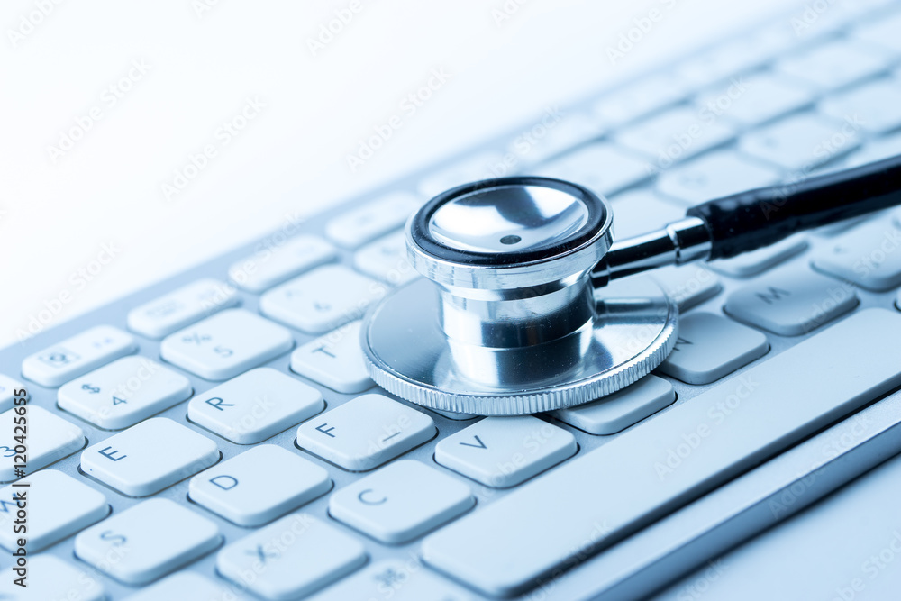 Stethoscope with a modern computer keyboard Stethoscope with a modern computer keyboard