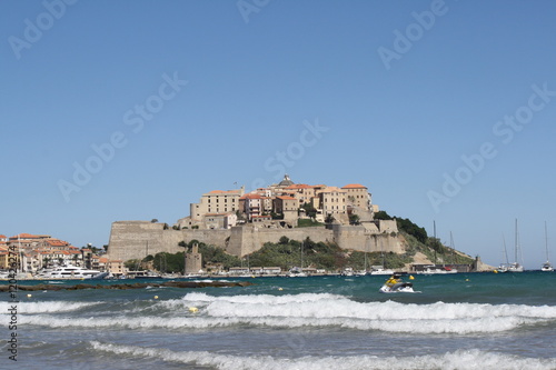 corsica, calvi. a view of old city, harbor, sea and beach