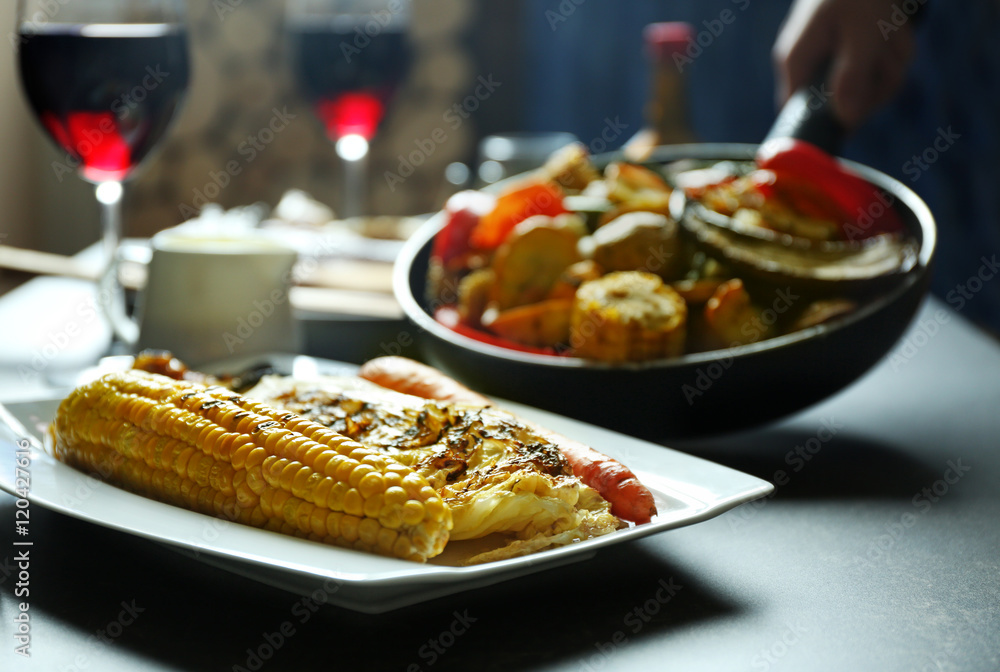 Delicious dinner with grilled vegetables and wine Delicious dinner with grilled vegetables and wine