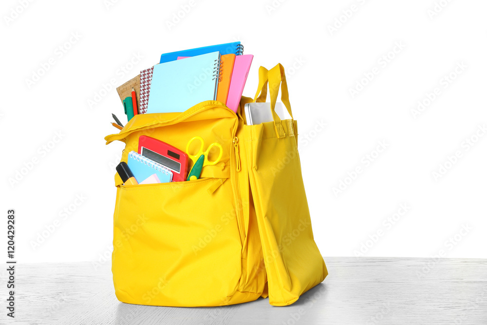 Yellow school backpack isolated on white Yellow school backpack isolated on white