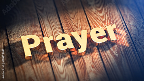 Word Prayer on wood planks