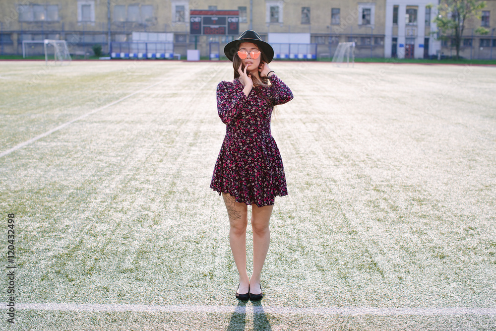 Naklejka premium Girl in dress posing