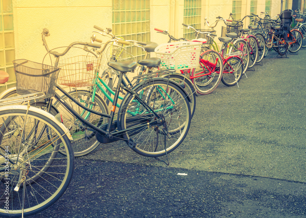 Row of bikes parking ( Filtered image processed vintage effect.