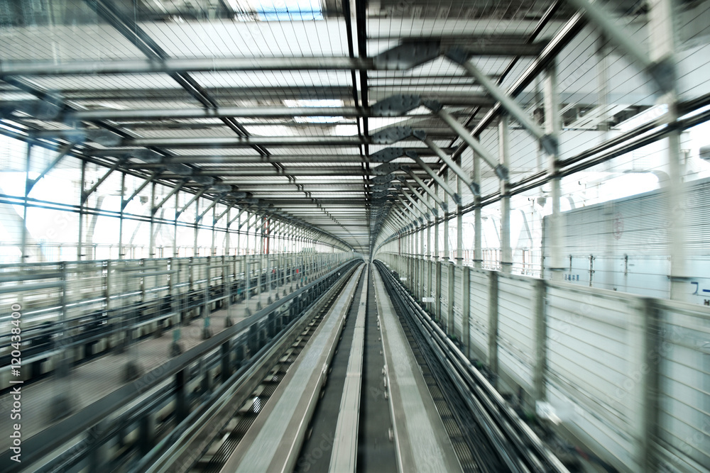 Picture inside a commuter train in Tokyo aproaching the end of Odaiba's Rainbow bridge.