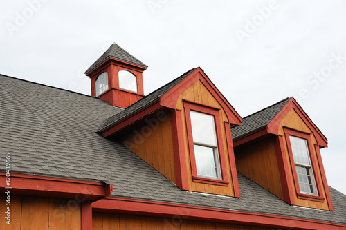 old style roof of house under the blue sky