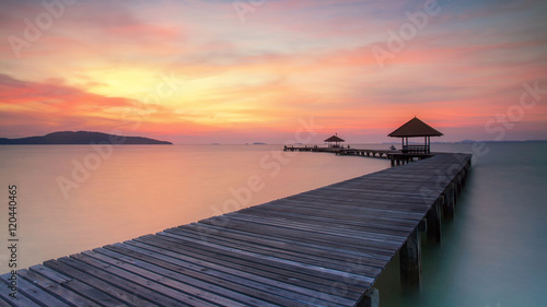 Fototapeta Naklejka Na Ścianę i Meble -  Wooden pier between sunset in Phuket