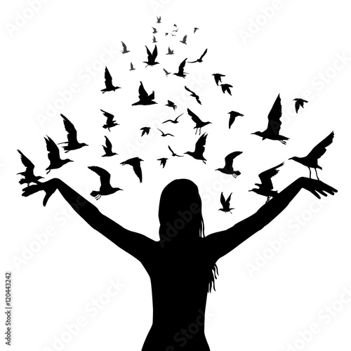 Learning to fly concept with silhouettes of woman and birds