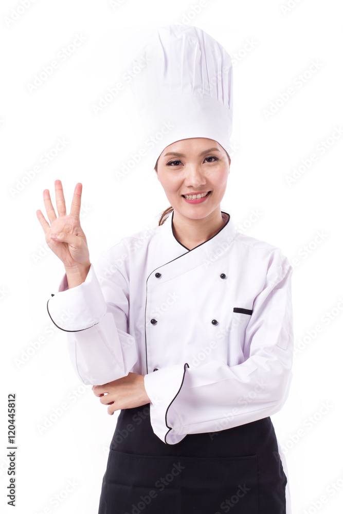 happy, smiling, positive female chef pointing up four fingers happy, smiling, positive female chef pointing up four fingers