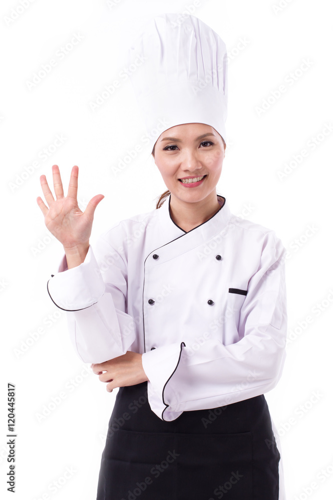 happy, smiling, positive female chef pointing up five fingers happy, smiling, positive female chef pointing up five fingers