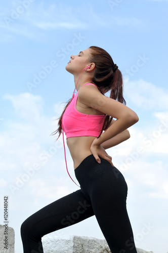Girl performs stretching back