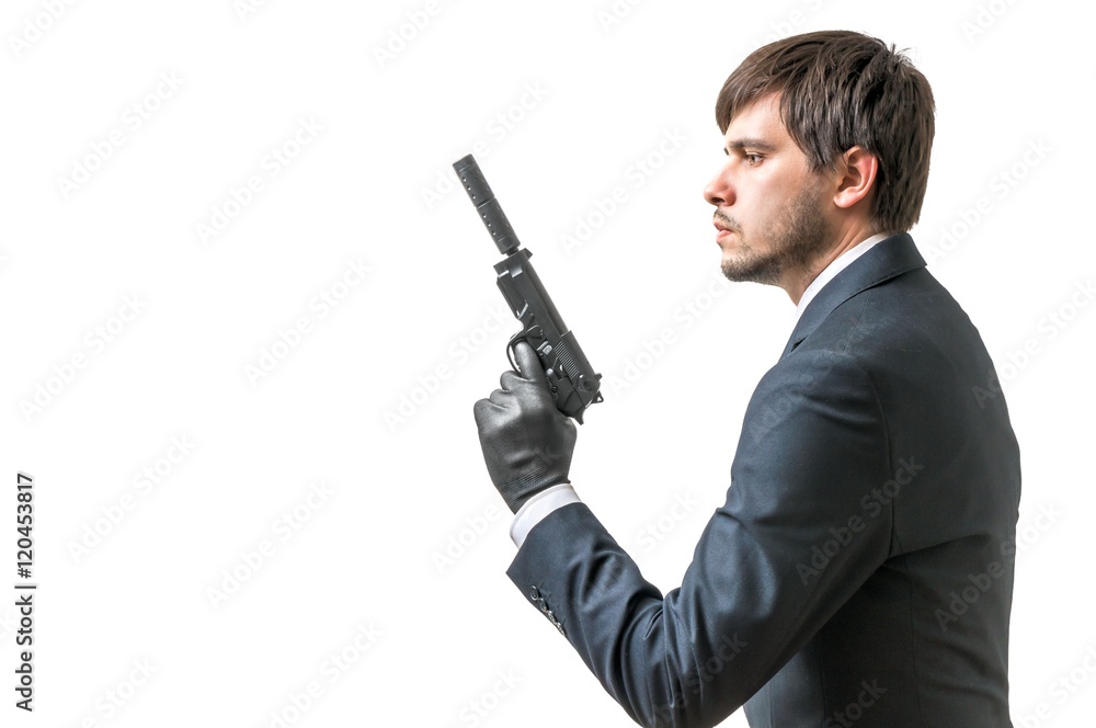 Secret aghent or spy holds pistol with silincer in hand. Isolated on white background. Secret aghent or spy holds pistol with silincer in hand. Isolated on white background.