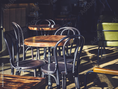 Table and Chairs Seats outdoor Cafe Restaurant with morning light photo