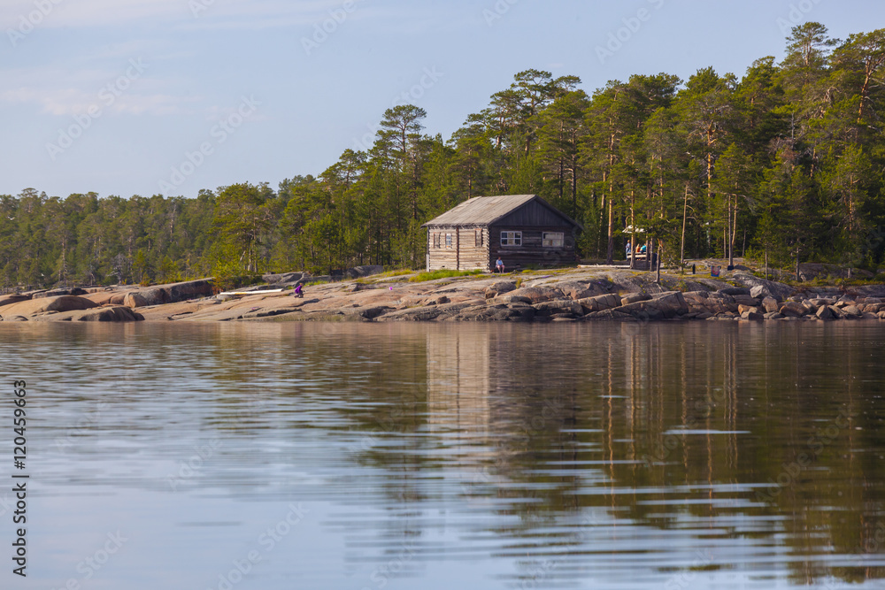 wooden house on the northern rocky shore wooden house on the northern rocky shore