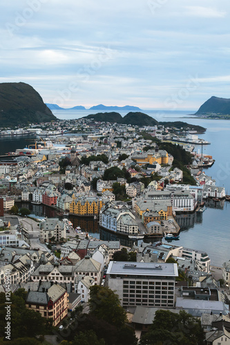 Beautiful super wide-angle summer aerial view of Alesund, Norway, with skyline and scenery beyond the city, seen from the observation deck of Aksla mountain