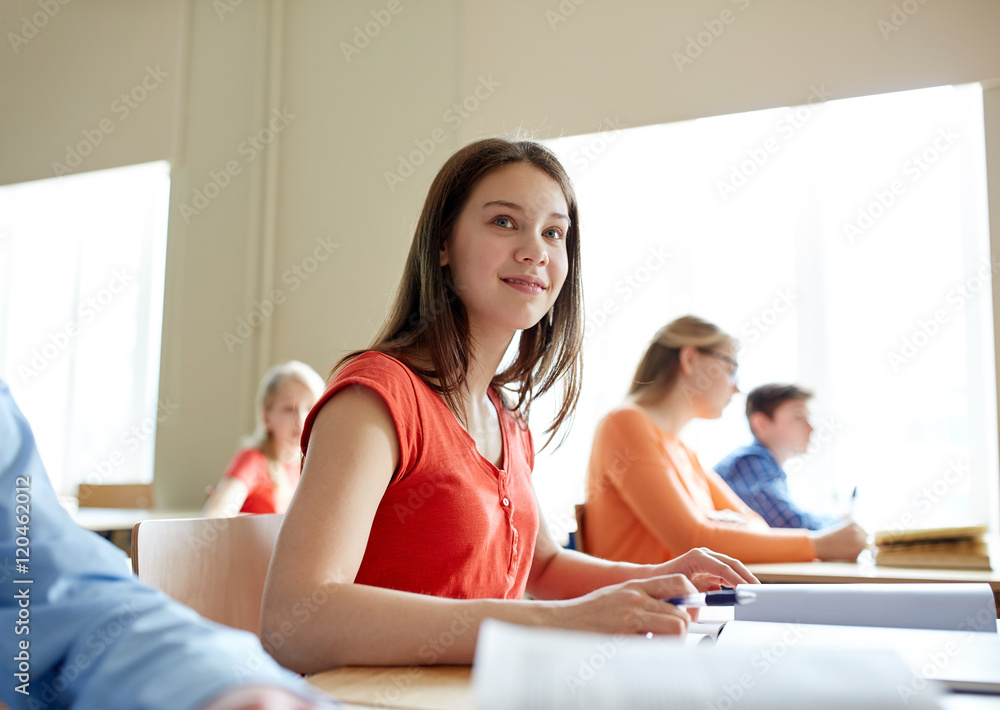happy student girl with book writing school test happy student girl with book writing school test