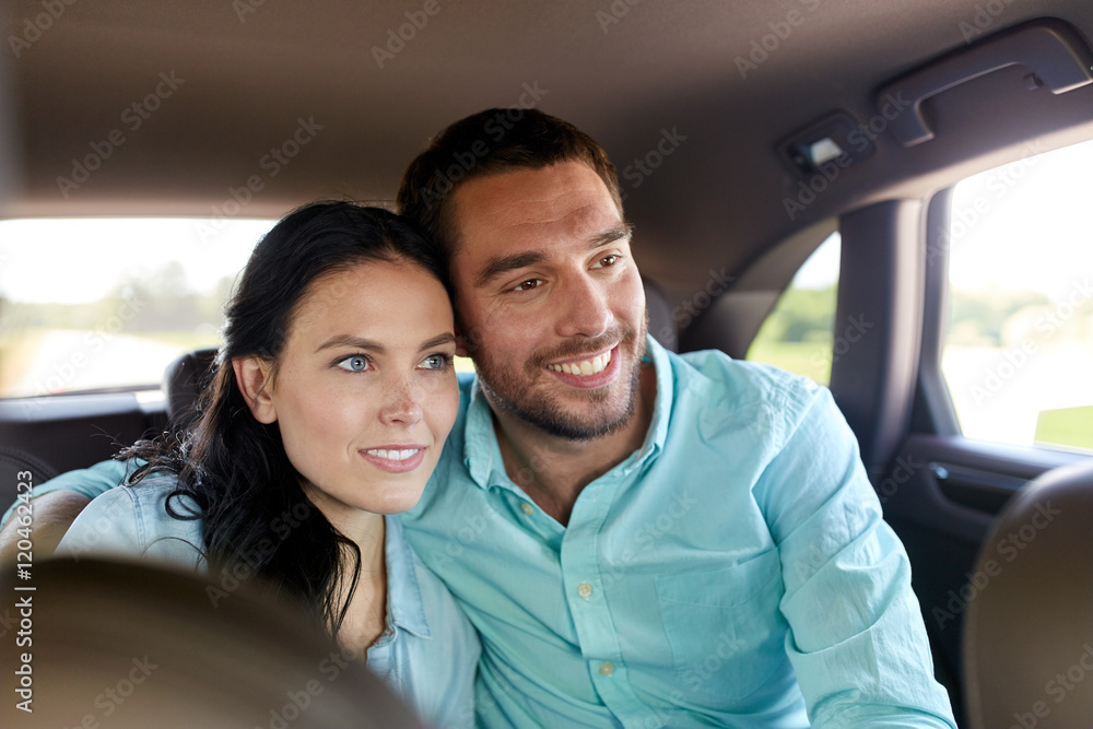 happy man and woman hugging in car happy man and woman hugging in car